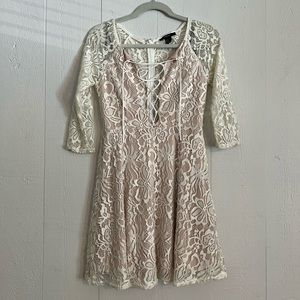 White lacy tie up dress with nude slip